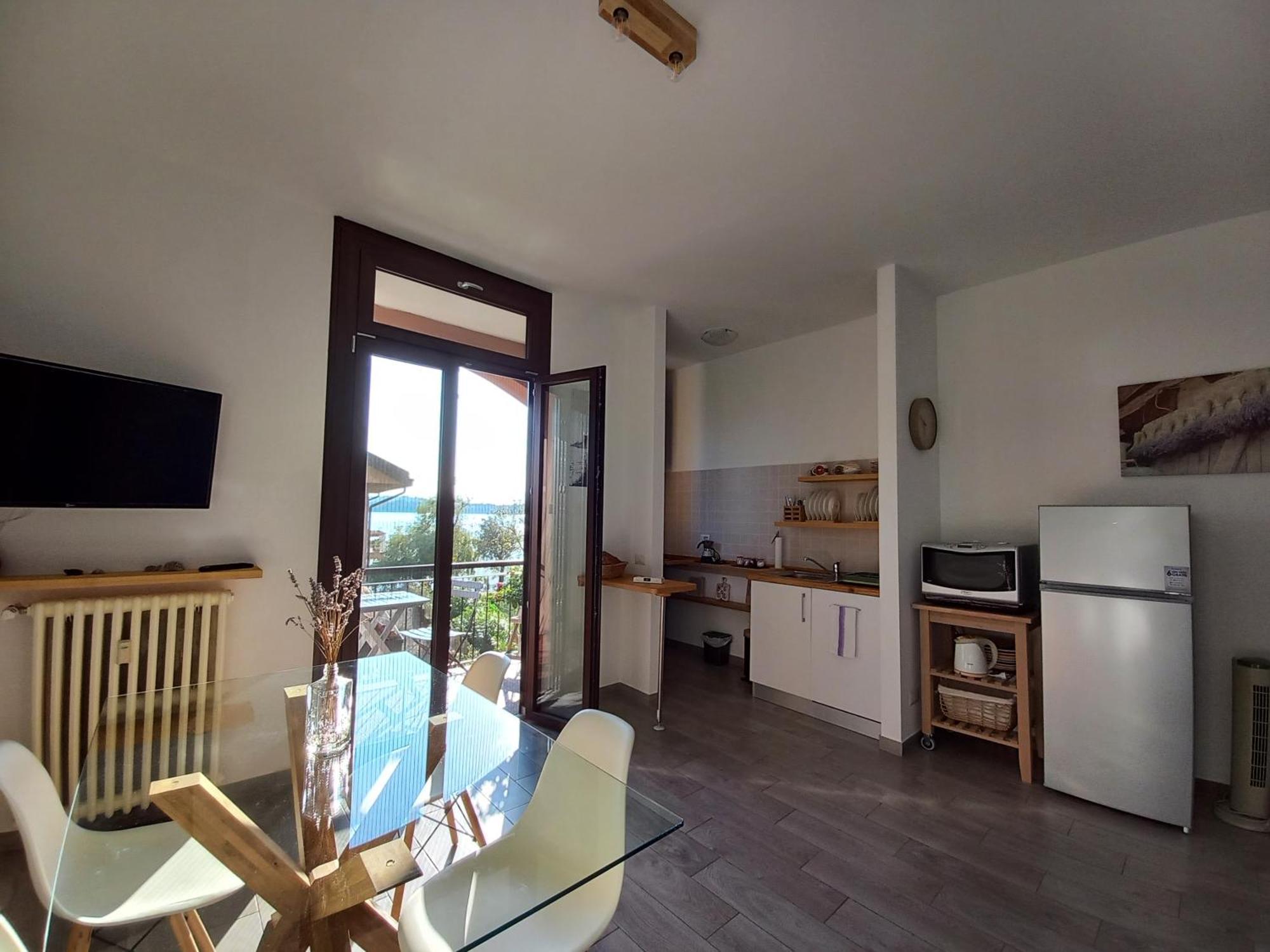 Appartamento Miralago Con Giardino Sul Lago กาวิราเต ภายนอก รูปภาพ